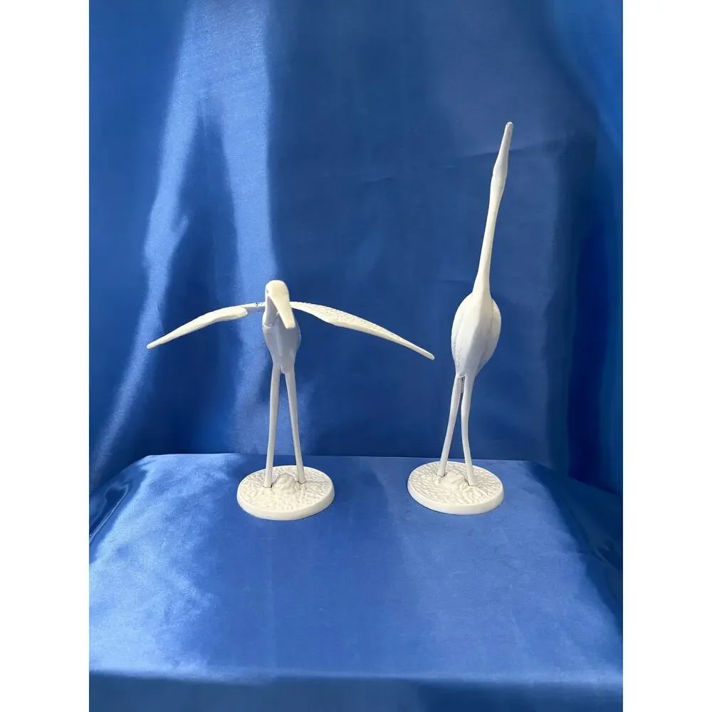 Pair of White Enamel Metal Cranes Accented with Blue Flower Design